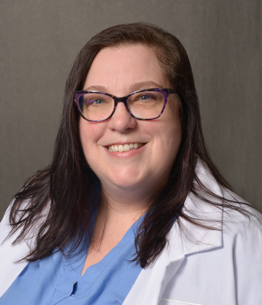 white female in lab coat