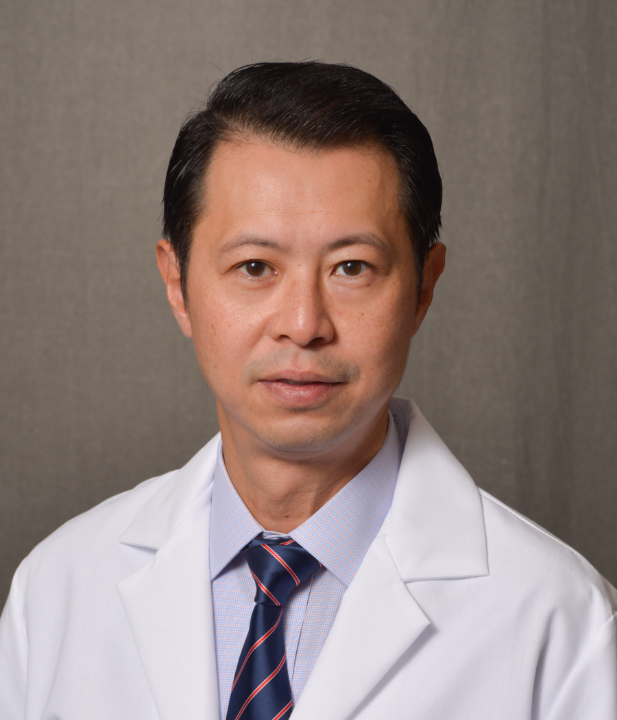 male physician with dark hair