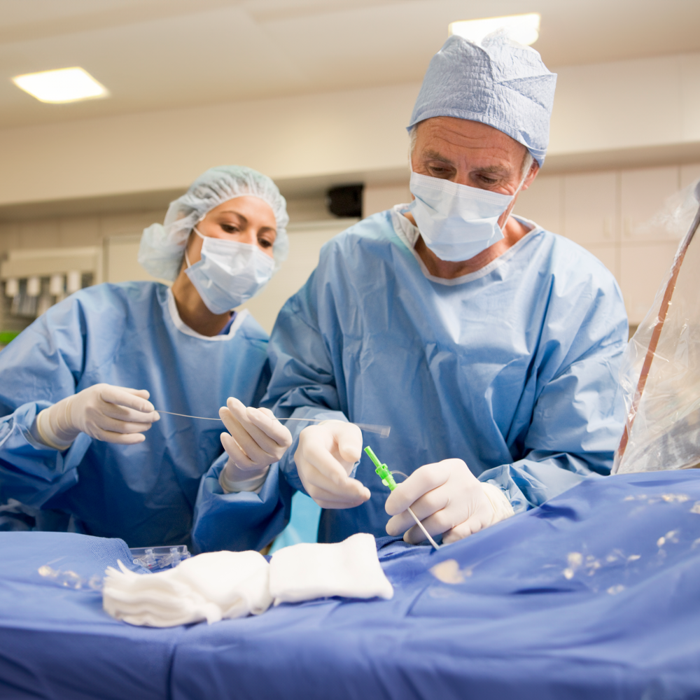 Surgeons Preparing Equipment For Surgery Wearing Hospital Mask Concentrating