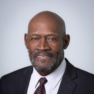 man wearing suit and tie